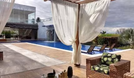 Casa com 6 quartos à venda no Bairro Cidade Jardim - Uberlândia/MG