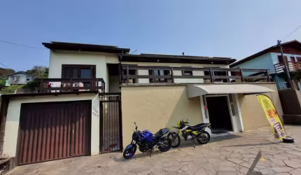 casa com 2 moradias mais ponto comercial - Bairro Charqueadas