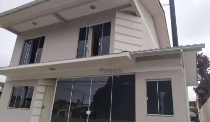 Casa com 3 dormitórios à venda, 143 m² por R$ 950.000,00 - Caminho Novo - Palhoça/SC