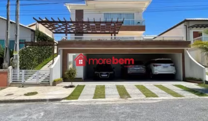 Casa em condomínio fechado com 4 quartos para alugar na Avenida Mário Theophilo Guerra, Nova São Pedro, São Pedro da Aldeia, 290 m2 por R$ 7.800
