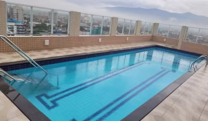 LINDO APARTAMENTO NA PRAIA A 300 METROS DA PRAIA - ÁREA DE LAZER COMPLETA COM PISCINAS