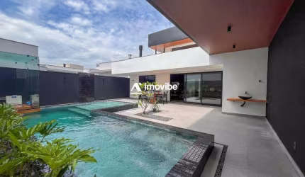 CASA CONDOMINIO - PORTEIRA FECHADA - SAUNA UMIDA - 3 SUITES - AVALIA PERMUTA -