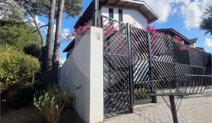 SOBRADO MARAVILHOSO A VENDA NO JARDIM GUAPIRA - 4 SUÍTES E 7 VAGAS DE GARAGEM