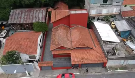 Terreno com casa