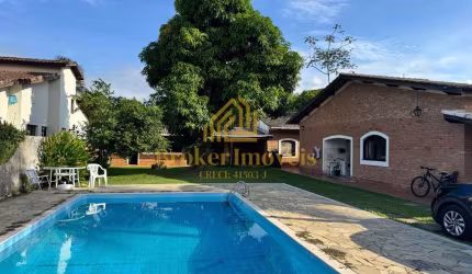 CASA TÉRREA COM 4 DORMITÓRIOS E PISCINA, 100M DA PRAIA NO JARDIM BRITÂNIA