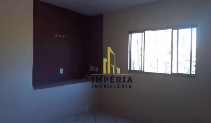 Casa com edícula