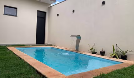 Casa em condomínio fechado com 3 quartos à venda no Grand Ville, Uberlândia  por R$ 1.290.000
