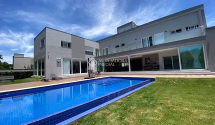 Casa em condomínio fechado com 6 quartos à venda na Rodovia Haroldo Soares Glavan, 1760, Cacupé, Florianópolis, 942 m2 por R$ 13.000.000