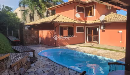 Casa em condomínio fechado com 4 quartos à venda na Rodovia Doutor Antônio Luiz Moura Gonzaga, 383, Rio Tavares, Florianópolis, 200 m2 por R$ 2.950.000