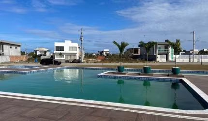 Terreno em condomínio fechado à venda na Ba-099  Km 26, Abrantes, Camaçari por R$ 170.000