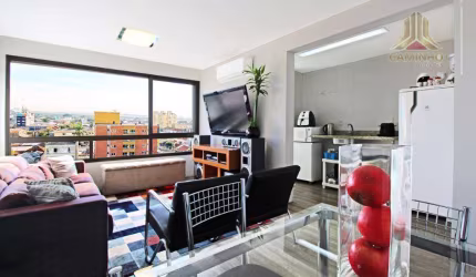 Apartamento de um dormitório, com suíte e duas vagas de garagem, andar alto, vista,