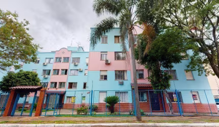 Vendo apartamento de dois dormitórios com garagem no Bairro Sarandi em Porto Alegre