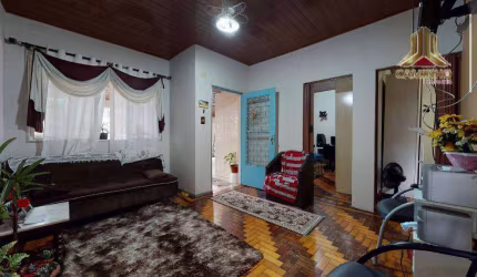 Vendo casa de dois dormitórios e oito vagas de garagem, bairro Sarandi em Porto Alegre
