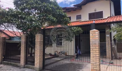 Casa com 4 quartos à venda no Carianos, Florianópolis  por R$ 1.700.000