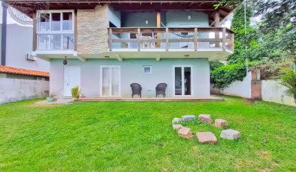 Casa em condomínio fechado com 3 quartos à venda no Campeche, Florianópolis  por R$ 1.980.000