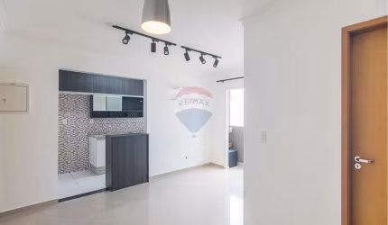 Apartamento pronto para morar com 48 m², 2 quartos, living amplo com varanda, cozinha americna e 1 vaga de garagem