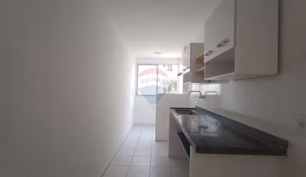 Apartamento de 65 m² com 3  quartos/1suíte, cozinha com armários e área de serviço , varanda e  1 vaga de garagem.