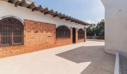 Casa em condomínio fechado com 3 quartos para alugar na Avenida América, 77, Auxiliadora, Porto Alegre por R$ 5.500