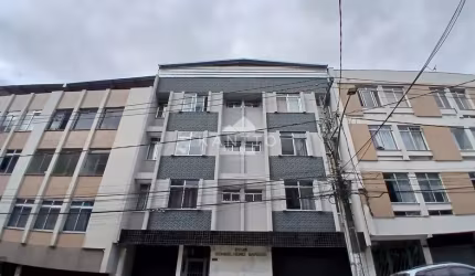 Apartamento três quartos com garagem, fundos com vista