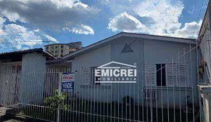 Casa de Alvenaria, com 154m² 3 dormitórios, sala, escritório, pátio e terraço.