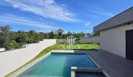 Casa Térrea à Venda no Condomínio Fazenda Jequitibá – 3 Suítes, Piscina e Integração com a Natureza