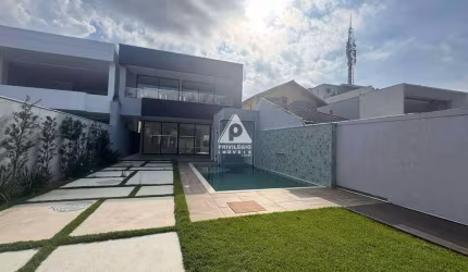 Casa triplex 4 suite 2 vagas condomínio Riomar II