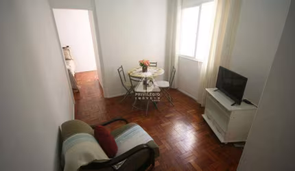 2 quartos, vista mar, próximo a praia, postaria 24 horas, frente.