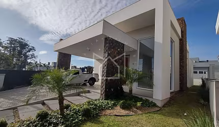 Casa em condomínio fechado com 3 quartos à venda na Rua Tupinambá, 35, São Vicente, Gravataí, 180 m2 por R$ 1.590.000