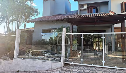 Casa com 4 quartos à venda na Rua Luiz Linck Barcelos, 160, Loteamento Jardim Timbaúva, Gravataí, 150 m2 por R$ 905.000