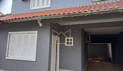 Casa com 3 quartos à venda na Rua Madre Teresa de Calcutá, 445, Loteamento Auxiliadora, Gravataí, 129 m2 por R$ 350.000