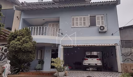 Casa com 5 quartos à venda na Rua Vinte de Setembro, Barnabé, Gravataí, 258 m2 por R$ 1.300.000