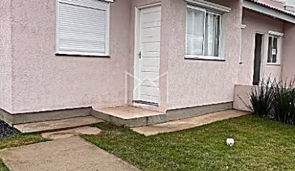Casa em condomínio fechado com 2 quartos à venda na Rua Porto Alegre, 377, Mato Alto, Gravataí, 44 m2 por R$ 200.000