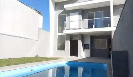 EXCELENTE SOBRADO ALTO PADRÃO EM GUARATUBA COM PISCINA (BREJATUBA)