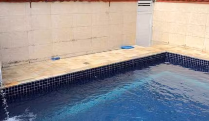 Casa com 2 dormitórios à venda, 110 m² por R$ 450.000 - Jardim Grandesp - Itanhaém/SP