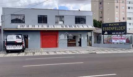 Casa à venda na Rua Irmãs Paulinas, 5060, Novo Mundo, Curitiba por R$ 2.800.000