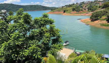 CASA EM CONDOMINIO FECHADO EM IGARATÁ ( PÉ NA AGUÁ ) COM PIER PROPRIO