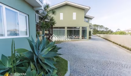 Casa em condomínio fechado com 3 quartos à venda na Rodovia Jornalista Manoel de Menezes, 2201, Praia Mole, Florianópolis, 137 m2 por R$ 1.600.000