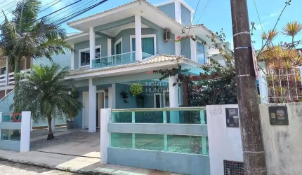 Casa com 3 dormitórios, piscina à 300 metros da praia à venda, 180 m² por R$ 1.600.000 - Ingleses -