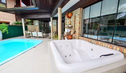 Casa com 7 dormitórios, piscina e ofurô para alugar, por R$ 7.100/dia - Jurerê Internacional - Flor