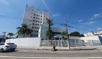 Apto com 2 dormitórios, próximo ao centro. Bairro tranquilo.