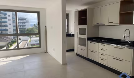 Apartamento locação com 2 dormitórios sendo 1 suíte, 67m² e 1 vaga em Florianópo