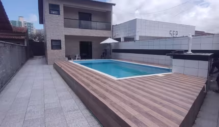 Sobrado para venda tem 250 metros quadrados com 4 quartos em Vila Atlântica - Mongaguá - SP