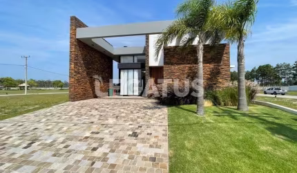 Casa em condomínio fechado com 3 quartos à venda na Rua Manoel Quadros, 1, Arroio Teixeira, Capão da Canoa por R$ 1.470.000