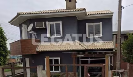 Casa com 3 quartos à venda na Rua Beta do Centauro, 40, Arco Íris, Capão da Canoa por R$ 600.000