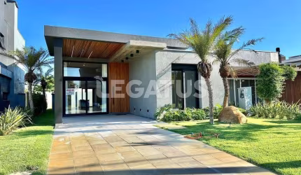 Casa com 3 quartos à venda na Rua Marabá, 3407, Navegantes, Capão da Canoa por R$ 1.170.000