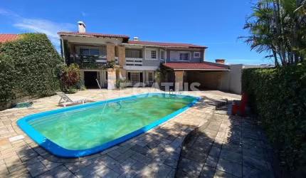 Casa com 4 quartos à venda na Rua Paná Paná, 892, Atlântida, Xangri-Lá por R$ 895.000