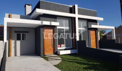 Casa com 2 quartos à venda na Rua Espanha, 252, Zona Norte, Capão da Canoa por R$ 500.000