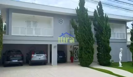 Casa de condomínio à venda de 540M²,  5 Suítes, 6 Vagas no residencial 5, Alphaville, Santana de Pa