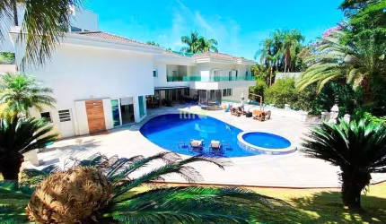 Casa mobiliada à venda de 1500M², 4 Dormitórios, 4 suítes, closet, piscina aquecida, 10 vagas no Ta