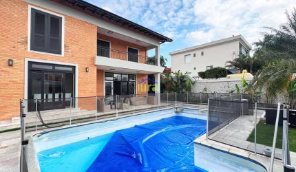 Casa à venda de 550M²,  4 suítes, ambientes integrados e um belíssimo espaço gourmet, 6 vagas, Resi